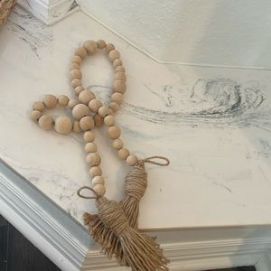 Decorative wooden beads with tassels